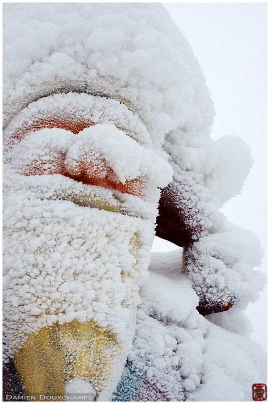 Frost-covered Santa Claus statue in Rovaniemi