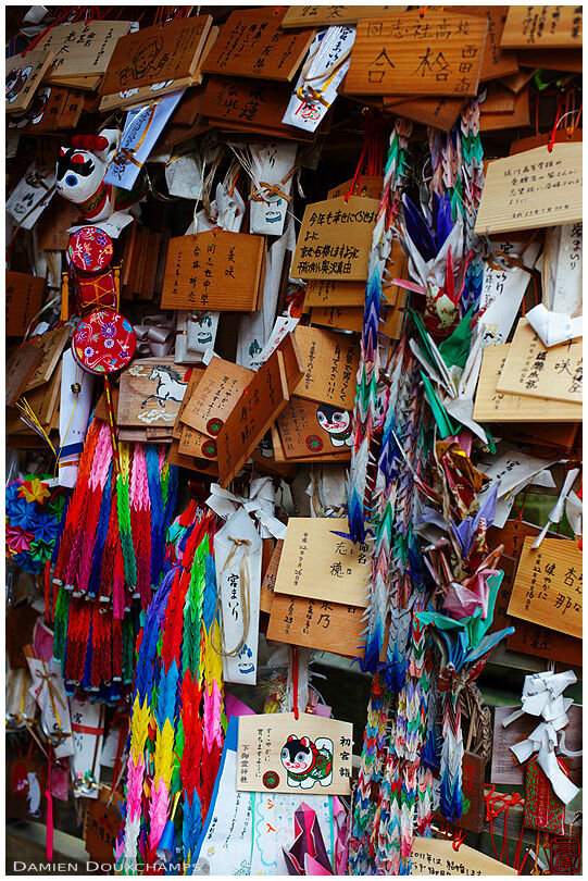 Ema tablets, origami folded cranes and other votive offerings in Shimogoryo shrine