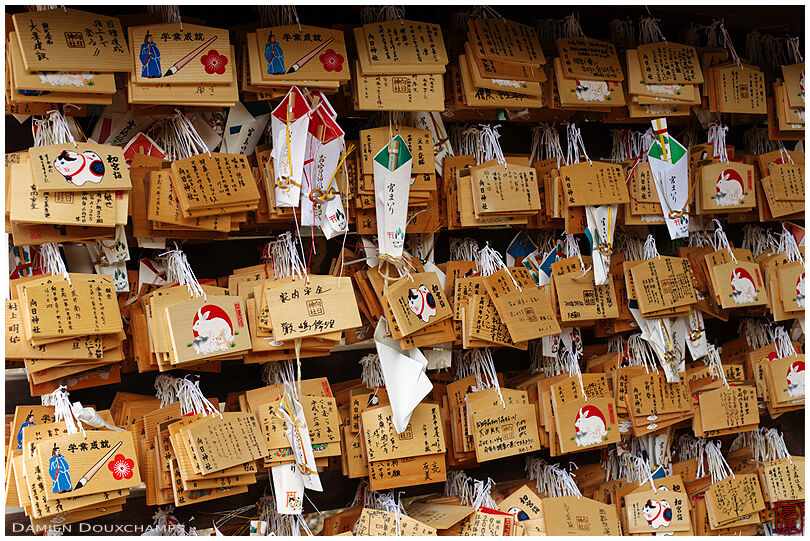 Ema tablets and other votive offerings in Muko-jinja shrine