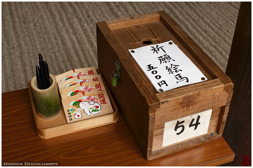 Ema tablets for sale: just write a wish... (Yoshida shrine)