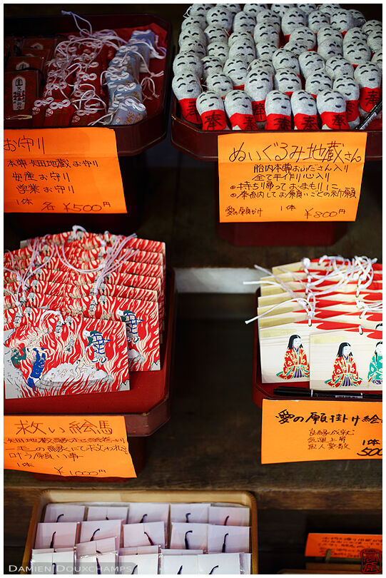 Ema tablets, miniature jizo statues and other charms for sale in Yata-dera temple