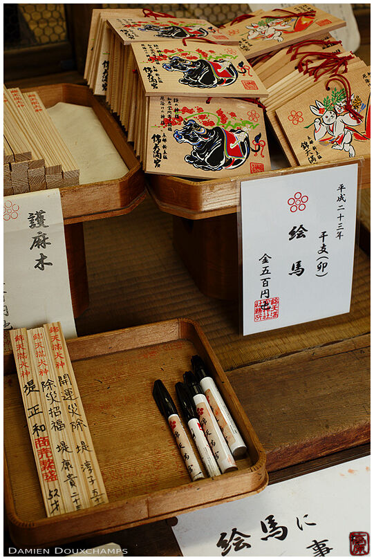 Ema tablets and other votive offerings for sale in Nishiki-tenmangu