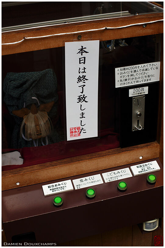 Furtune dispensing robot in Nishiki shrine, Kyoto, Japan