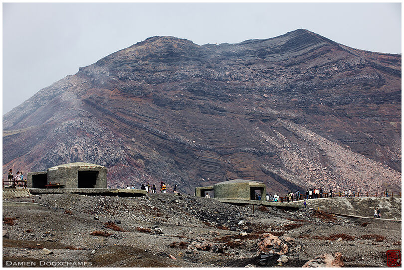Protection bunkers along the promenade around Mt. Aso crater