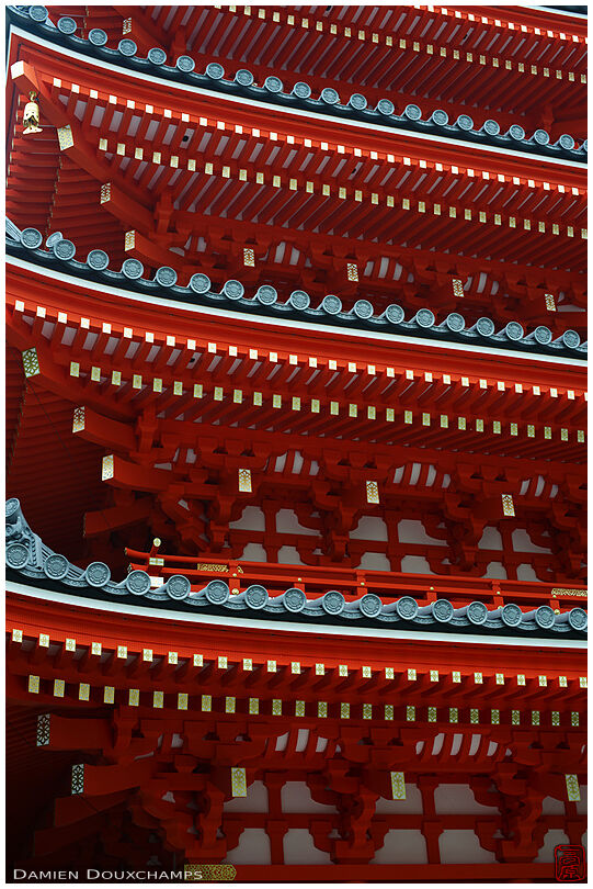 Red pagoda roof lines, Tocho-ji temple