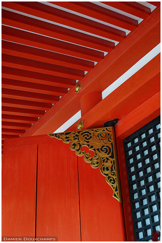 Orange temple structure with ornated door hinge, Enryaku-ji