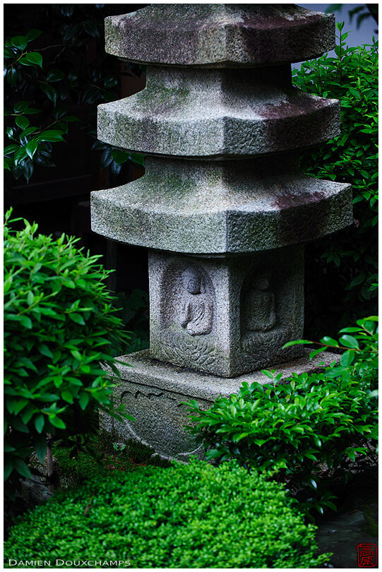 Stone pagoda among vegetation, Myoren-ji temple