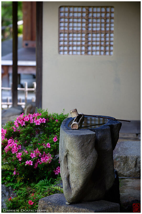 Bamboo ladle on stone water basin, Chishaku-in zen gardens