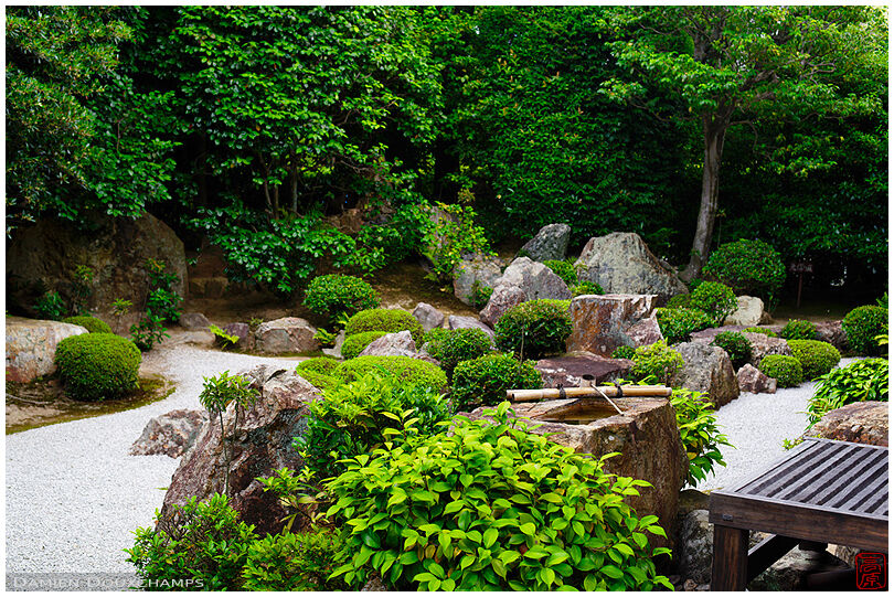 Terrace with stone water basin in zen garden, Taizo-in temple