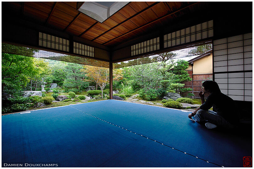 Making a pause in Nishimura Villa's zen garden