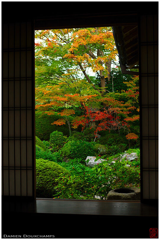 Desk with window on zen garden in autumn, Genko-an temple