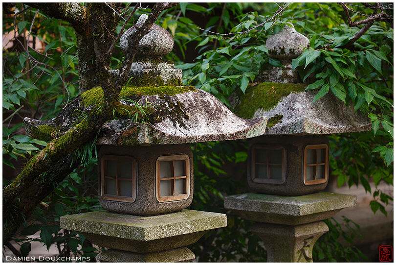 Twin, moss-covered lanterns, Kitano Tenmangu shrine