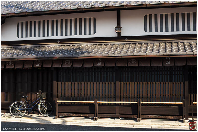 Bicycle in front of a traditional merchant's house, Kyoto