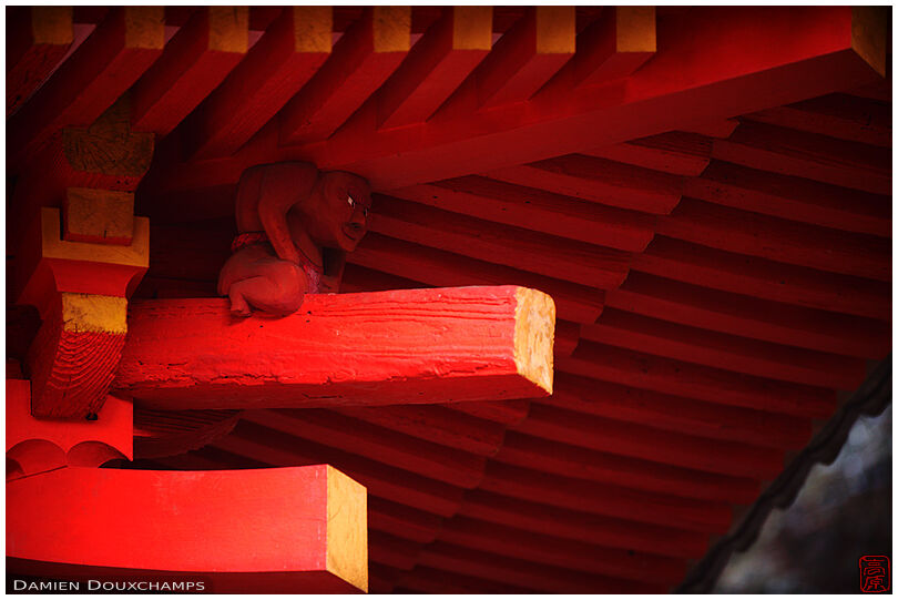 Small figure holding a pagoda's roof, Ganzen-ji temple