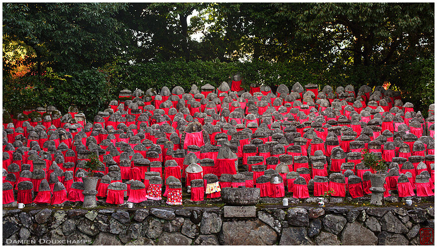 Numerous jizo statues with red cloths, Risho-in temple