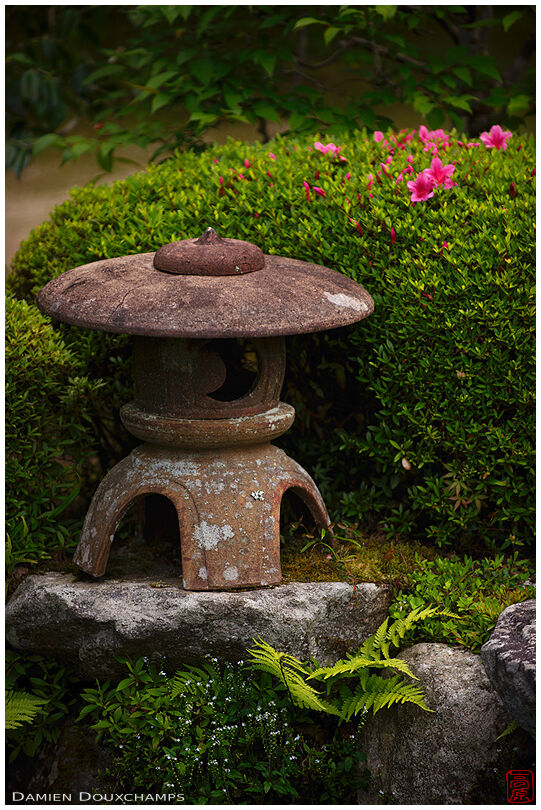 Small terracotta lantern in Jikko-in temple garden, Kyoto, Japan