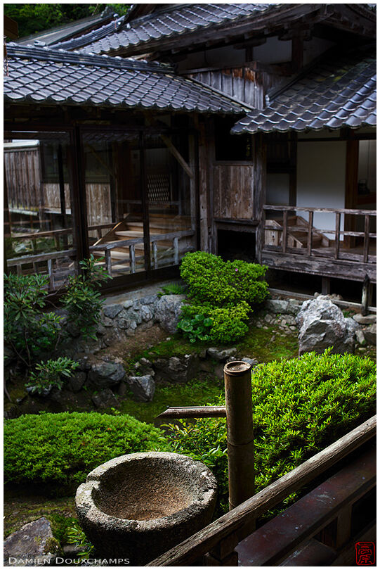 Dry tsukubai water basin in the remote mountain temple of Amida-ji, Kyoto, Japan