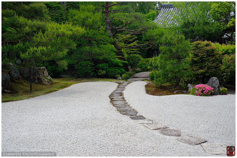 Stepping stones across rock garden in Konchi-in temple, Kyoto, Japan