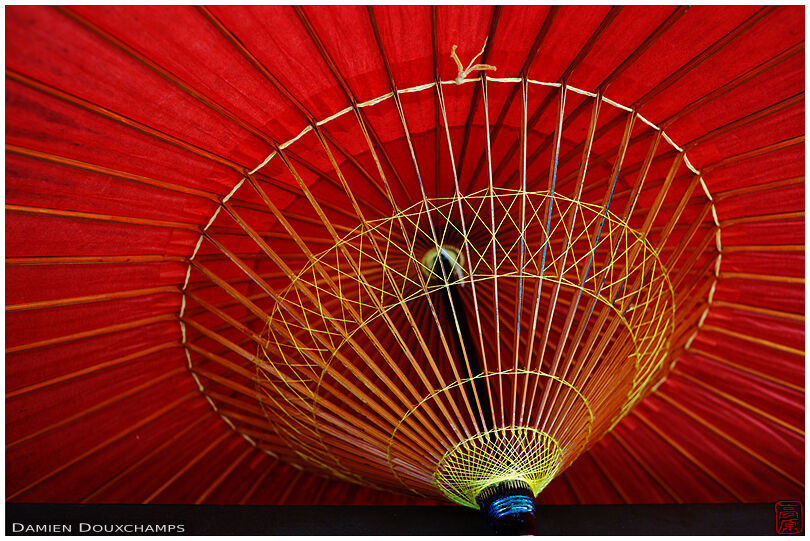 Traditional red umbrella detail, Miyagawa-cho geisha district, Kyoto, Japan