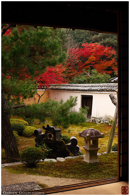 Old roof tile ornaments in moss garden, Rokuo-in temple, Kyoto, Japan