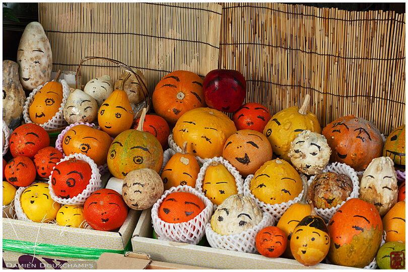 Smiling ornamental fruits in Nishiki market, Kyoto, Japan