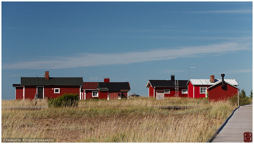 Small red wooden houses on Hailuoto island, Oulu, Finland