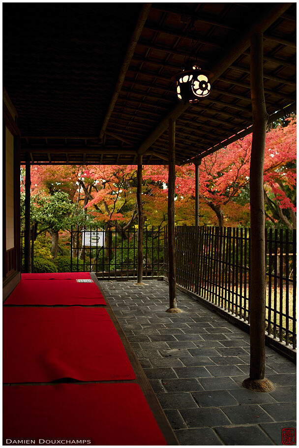 Rest area and autumn colours in Yoshiki-en garden, Nara, Japan