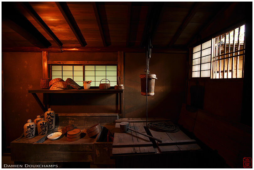 Well and kitchen with old utensils in the Rakushisha hermitage, Kyoto, Japan