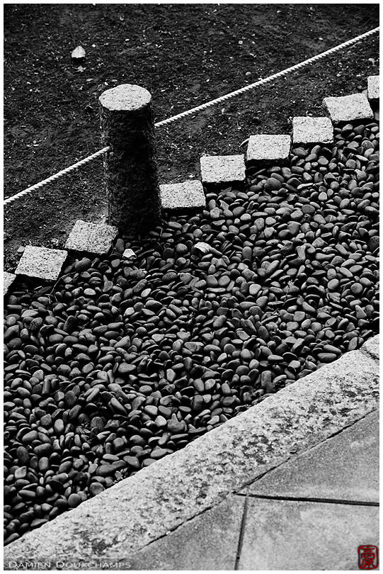 Various layers of stones on the edge of a garden, Shoko-in temple, Kyoto, Japan