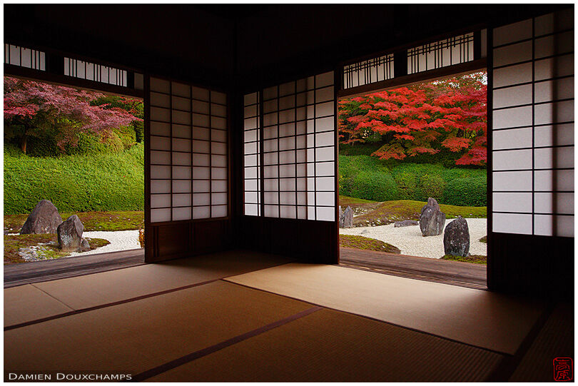 Rock garden and its autumn colours from a room of Komyo-in temple, Kyoto, Japan
