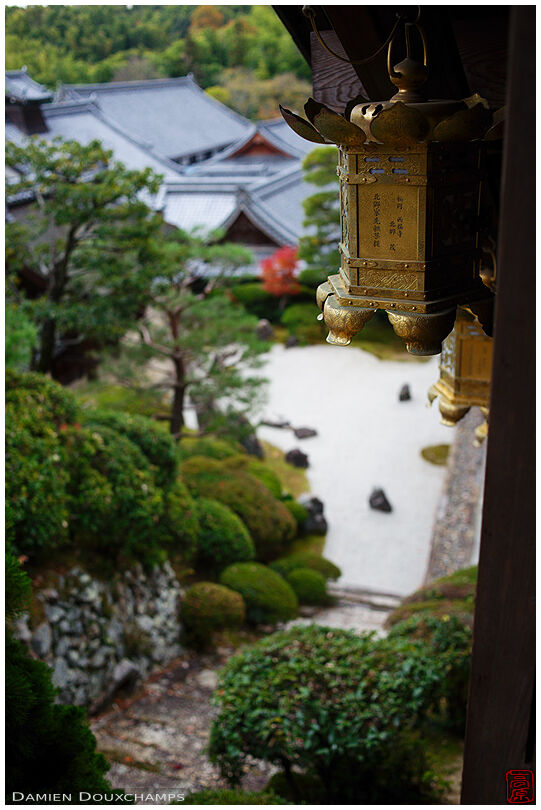 Golden lantern on the way down to Komyo-ji temple rock garden, Kyoto, Japan