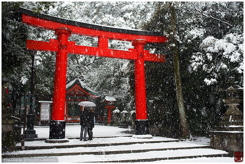 Heavy snow falling on Fushimi Inari shrine, Kyoto, Japan