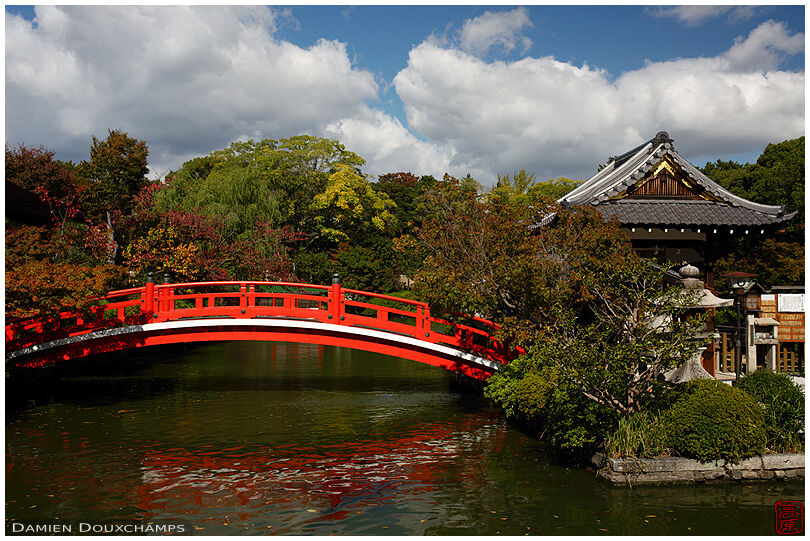 Red bridge to small island in Shisen-en garden, Kyoto, Japan