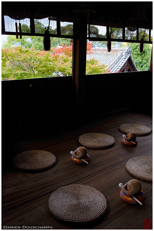 Wooden bells and zabuton cushions in a small hall of Chion-in temple, Kyoto, Japan