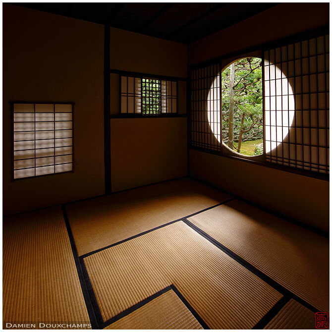 Round window in small tea room of Funda-in temple, Kyoto, Japan