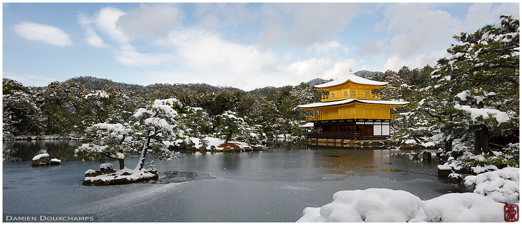 Snow covered golden pavilion in winter, Kinkaku-ji temple, Kyoto, Japan