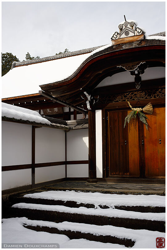 Snowy secondary gate of Ryoan-ji temple, Kyoto, Japan