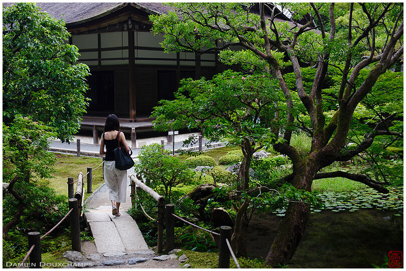 Woman strolling in the garden of Nanzen-in temple, Kyoto, Japan