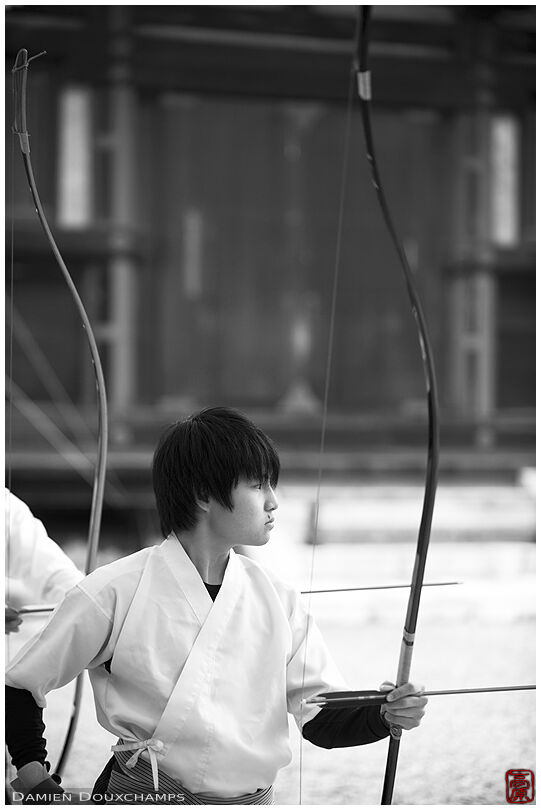 Archer ready to shoot during the toshiya competition in Sanjusangen-do temple, Kyoto, Japan
