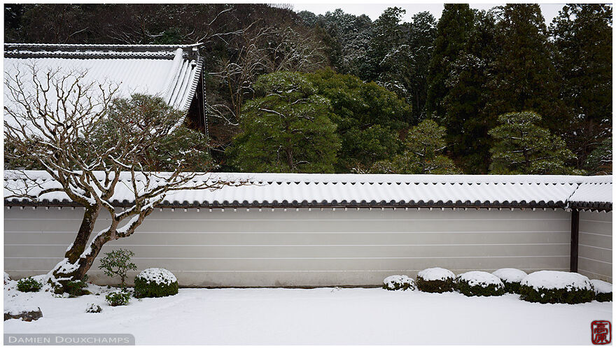 Simplicity in a snow covered zen garden of Nanzen-ji temple, Kyoto, Japan