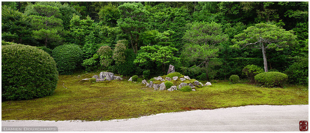 Stones and moss in the simple and relaxing dry landscape garden of Funda-in temple, Kyoto, Japan