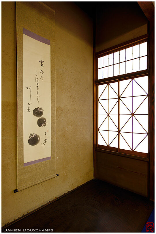 Scroll with persimmons hanging in tokonoma in the Fujita house, Kyoto, Japan