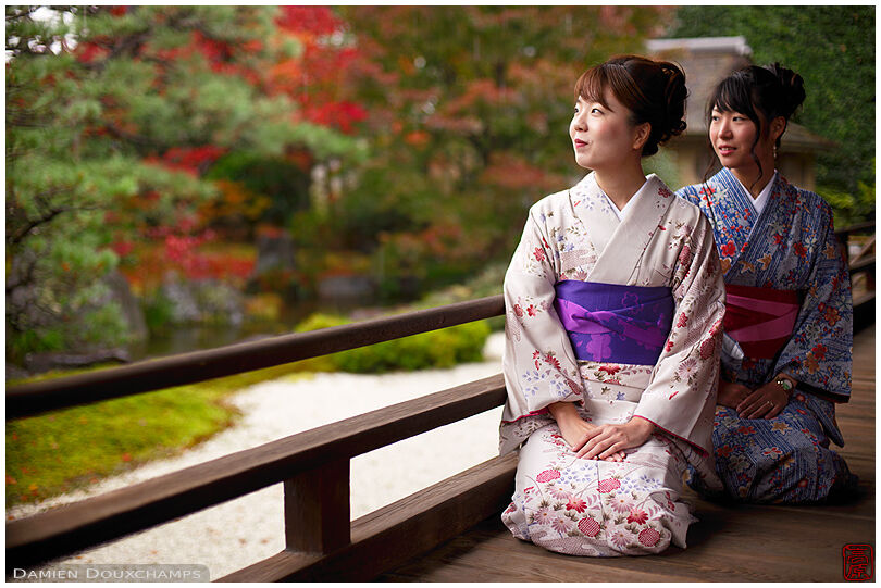 Two ladies in kimono sitting on the terrace of Shodeneigen-in temple garden, Kyoto, Japan