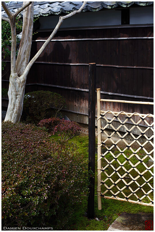 Small bamboo gate in Yotoku-in temple garden, Kyoto, Japan