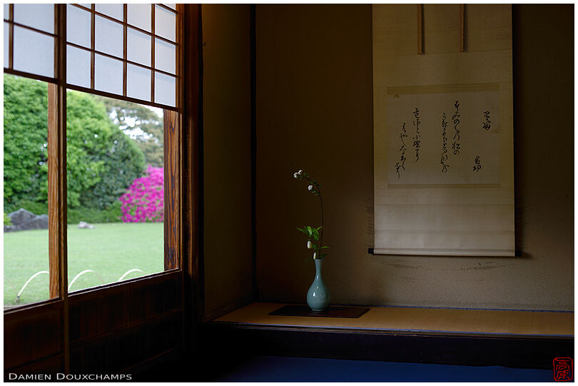Ikebana floral composition and hanging scroll in the tea room of Jonan-gu temple during azalea season, Kyoto, Japan