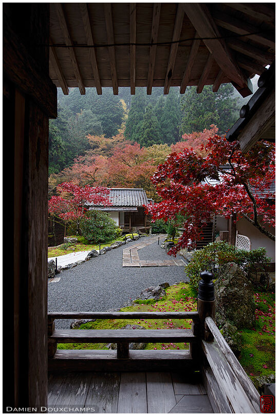 Main hall terrace and autumn colours in Amida-ji temple in the mountains of Ohara valley, Kyoto, Japan