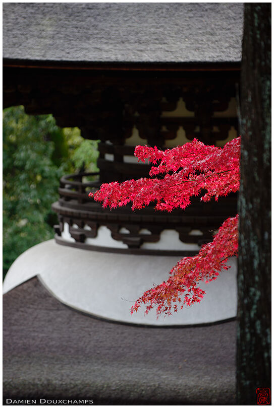 Pagoda with a touch of red autumn colours, Ishiyama-dera temple, Shiga, Japan
