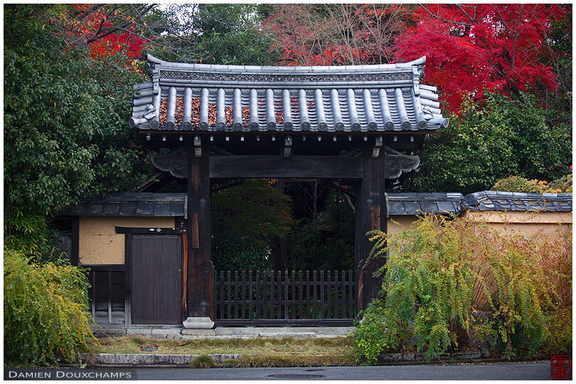Old and derelict temple entrance gate near Yoshida-yama in Kyoto, Japan