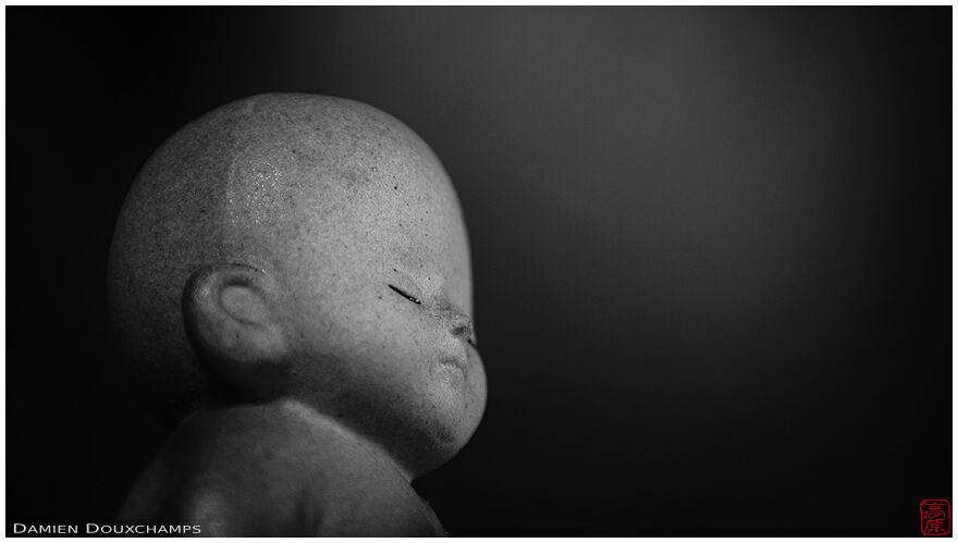 Small statue of a Buddha or child, Choju-ji temple, Shiga, Japan