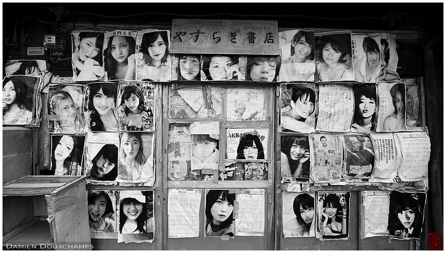 Wall covered with women photographs in Nara, Japan